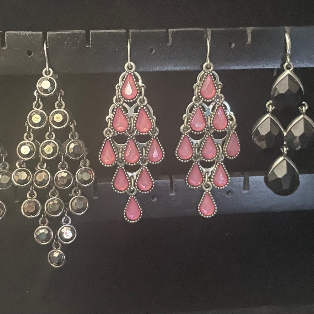 3 pair of dangle earrings.